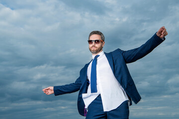 successfull boss in suit on sky background. boss in suit outdoor. boss in business suit.