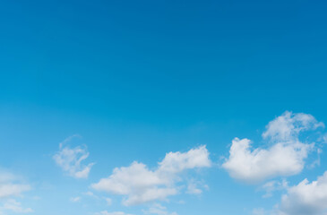 Obraz premium Blue Sky and Fluffy Clouds in Spring, Clear Sky in Sunny day Summer,Horizon Beautiful Nature for Environmental or Earth Day Banner