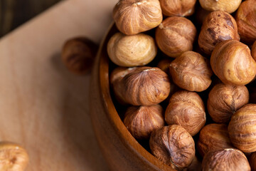 Peeled hazelnuts during cooking, close-up of freshly picked hazelnuts in the kitchen