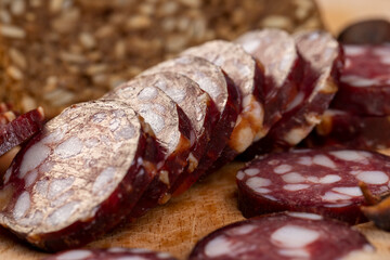 sliced high-quality pork sausage with the addition of lard pieces