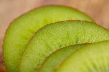 fresh green kiwi while cooking food in the kitchen