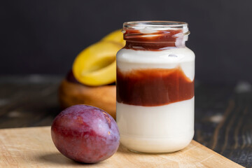 Ripe plums cut into pieces during cooking
