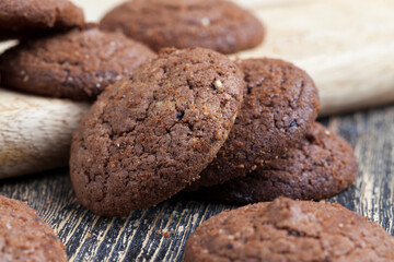 chocolate cookies on a wooden board