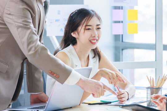 Closeup Shot Of Asian Professional Successful Cheerful Female Businesswoman In Casual White Dress Sitting Laughing While Listening To Lecturer Speaking In Company Office Conference Meeting Room