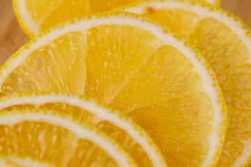 Yellow ripe lemon cut into slices