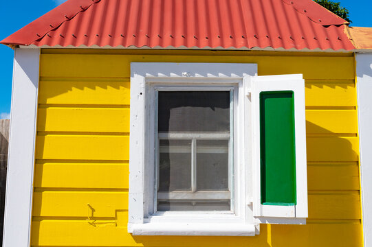 house window image. house window with shutter. house window bright color. photo of house window