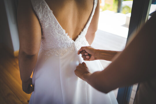 Creative photo of Bridal Preparation: Putting on Dress, Shoes, and Garter