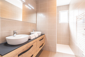 Naklejka na ściany i meble Home bathroom, bright new bathroom interior with tiled glass shower, vanity cabinet, wooden designed interior