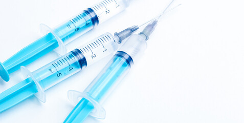 Disposable plastic syringe prepared for injection and vaccination in the hospital. The concept of medicine and health