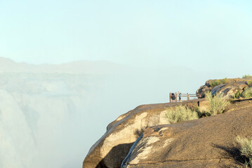 Tourists drenched by spray at viewpoint at Augrabies Falls