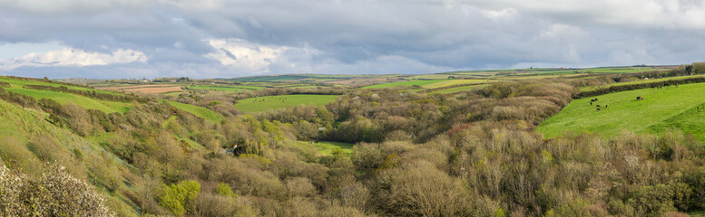 Fototapeta na wymiar panoramic daylight view of rural Devon looking towards Docton mill and Lymebridge
