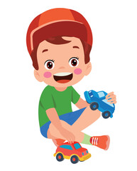 Boy playing with a toy car.