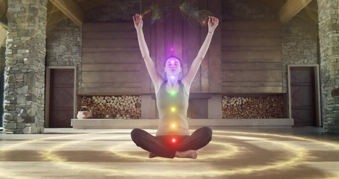 Beautiful Relaxed Caucasian Woman Meditating In Zenlike Openair Space. Animated Visualization Of Multi Colored Chakras Appearing On Her Body. Spirituality, Yoga, Self-care, Mindfulness Concept.