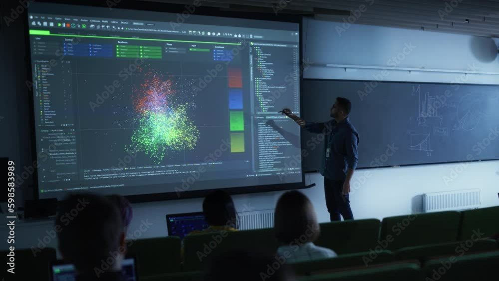 Poster Young University Professor Explaining the Importance of Artificial Intelligence to a Group of Diverse Multiethnic Students in a Dark Auditorium. Teacher Showing Big Data Ecosystem on Two Big Screens