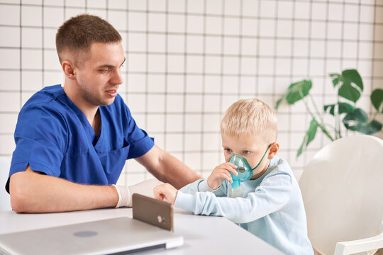 A pediatrician diagnoses lung disease and provides treatment. Breathe the medicine through a nebulizer inhaler.. Portrait of adorable little boy visiting doctor. Generative AI