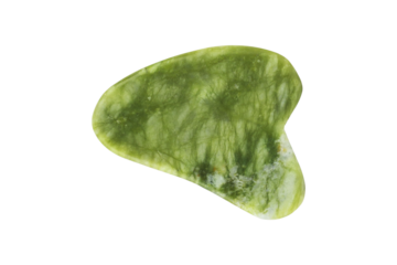 Gua Sha massager isolated from background, green jade stone for face and body care.