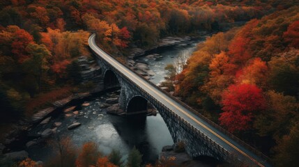A curving road with a bridge over a river below surrounded by fall foliage. Generative AI