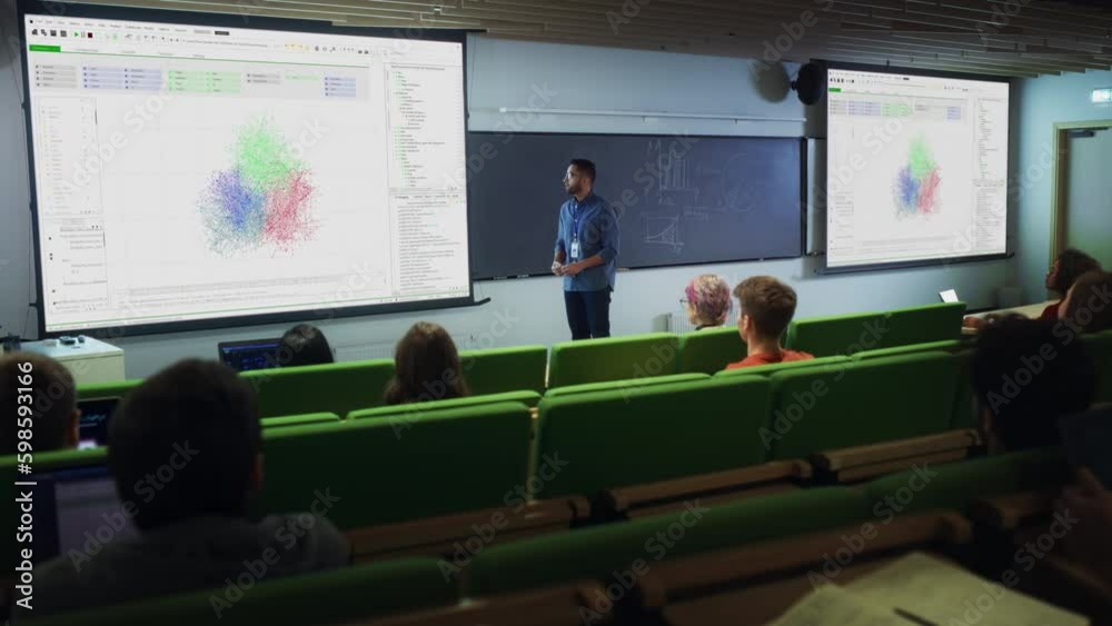 Fototapete young male teacher giving a data science lecture to diverse multiethnic group of female and male stu
