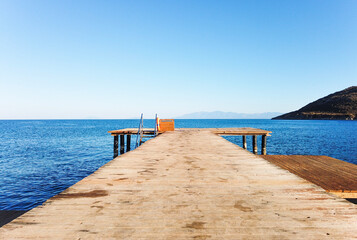 Obraz premium Wooden platform and sea landscape