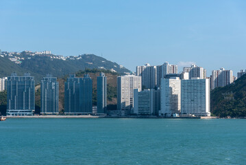 Fototapeta na wymiar Panorama of Chinese sea coast near Hong Kong. View from the sea side.