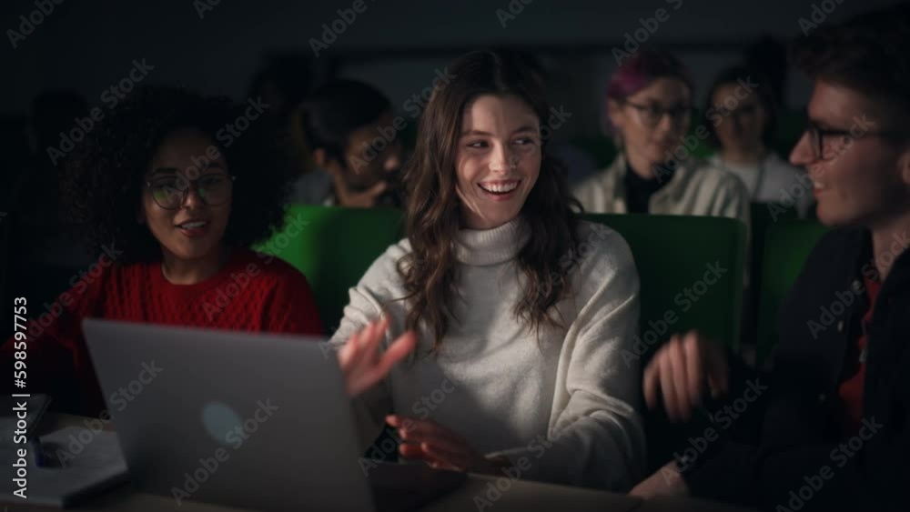 Poster diverse happy students having a conversation in university classroom, working on a shared research p