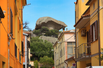 Fototapeta na wymiar View of the Mushroom Rock in Arzachena and the old town, Sassari - Sardinia