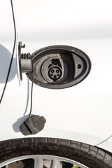 Lviv, Ukraine - May 19, 2018. Close View of the Opened Car Gas Tank Cap, Change from Fossil Fuel to Electric Power