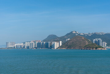 Fototapeta premium Panorama of Chinese sea coast near Hong Kong. View from the sea side.