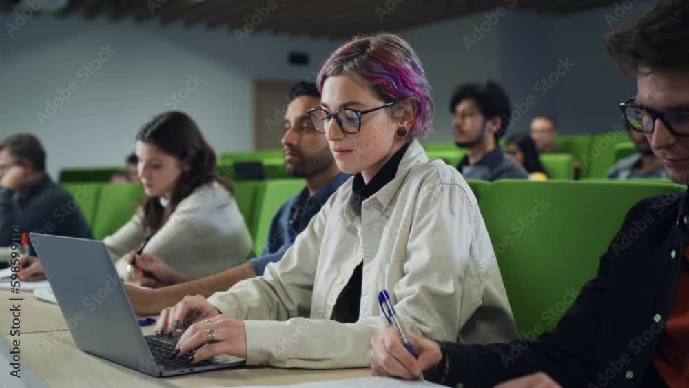 Fototapete smart creative female student studying in university with diverse multiethnic classmates. young woma