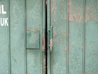 Aluminum doors with vertical lines and handles texture