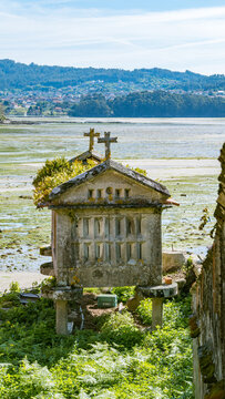 Combarro, Galicia, Spain - April 7, 2023: Traditional "horreo" (barn)
