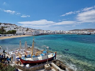 Landscape views of buildings and boats in mykonos