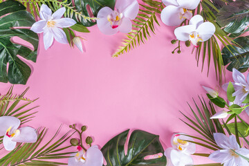 Pink colored summer vacation, travel and summer holiday background. Bright pink flatlay with tropical leaves and flowers, sea shells, starfish, flip-flops, hat, beach accessories, top view copy space