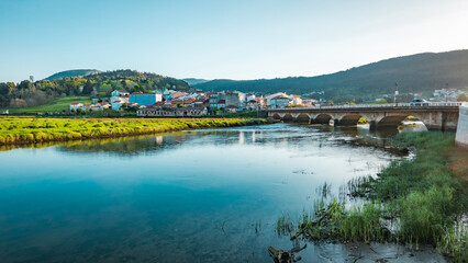 Fototapeta na wymiar Noia, Galicia, Spain - April 4, 2023: General view of the town and River Vilacoba