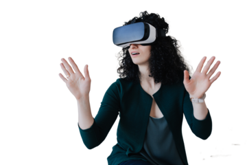 Curly-haired young woman in a green cardigan spreads her arms using virtual glasses at home resting after work against transparent background. Leisure activity.