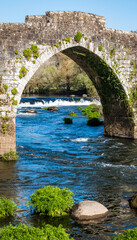 Fototapeta na wymiar A Ponte Maceira, Galicia, Spain - April 4, 2023: Close up of the bridge
