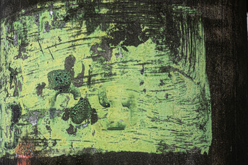 Fototapeta premium Green paint on black metal pole grunge texture