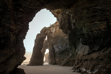 Ribadeo, Galicia, Spain - April 2, 2023: Natural arches in "Praia das Catedrais" (Beach of the Cathedrals)