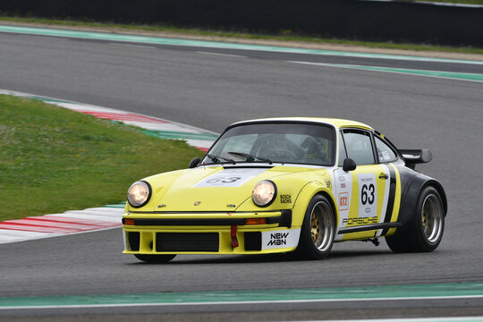 Scarperia, 2 April 2023: Porsche 930 Turbo in action during Mugello Classic 2023 at Mugello Circuit in Italy..