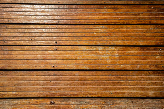 wooden textua on the jetty under the sunlight