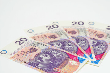 Polish banknotes of 20 złoty close up on a light background