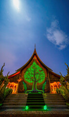 Sirindhorn Wararam Phu Prao is public Temple (Wat Phu Prao) at night ,It will appear green, blue glow in the night at Sirindhorn district of Ubonratchathani Thailand. Amazing temple in evening, Asia
