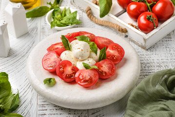 tomatoes with mozzarella and basil