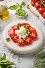 tomatoes with mozzarella and basil