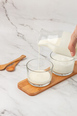 lactose yogurt. Probiotic cold fermented dairy drink. vertical image. top view. place for text