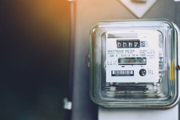 Electric power meter measuring power usage. Watt hour electric meter measurement tool at pole,...