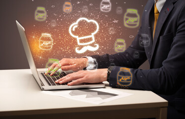 Hand searching for recipes on the internet