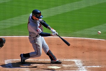 Baseball Player Striking Ball, Moment of Impact, Intense Action, Generative AI