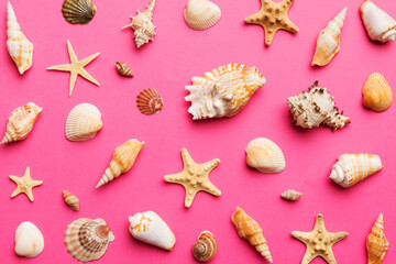 Summer time concept Flat lay composition with beautiful starfish and sea shells on colored table, top view - Powered by Adobe