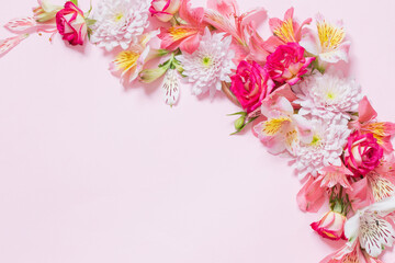 alstroemeriaand chrysanthemums  flowers on pink background